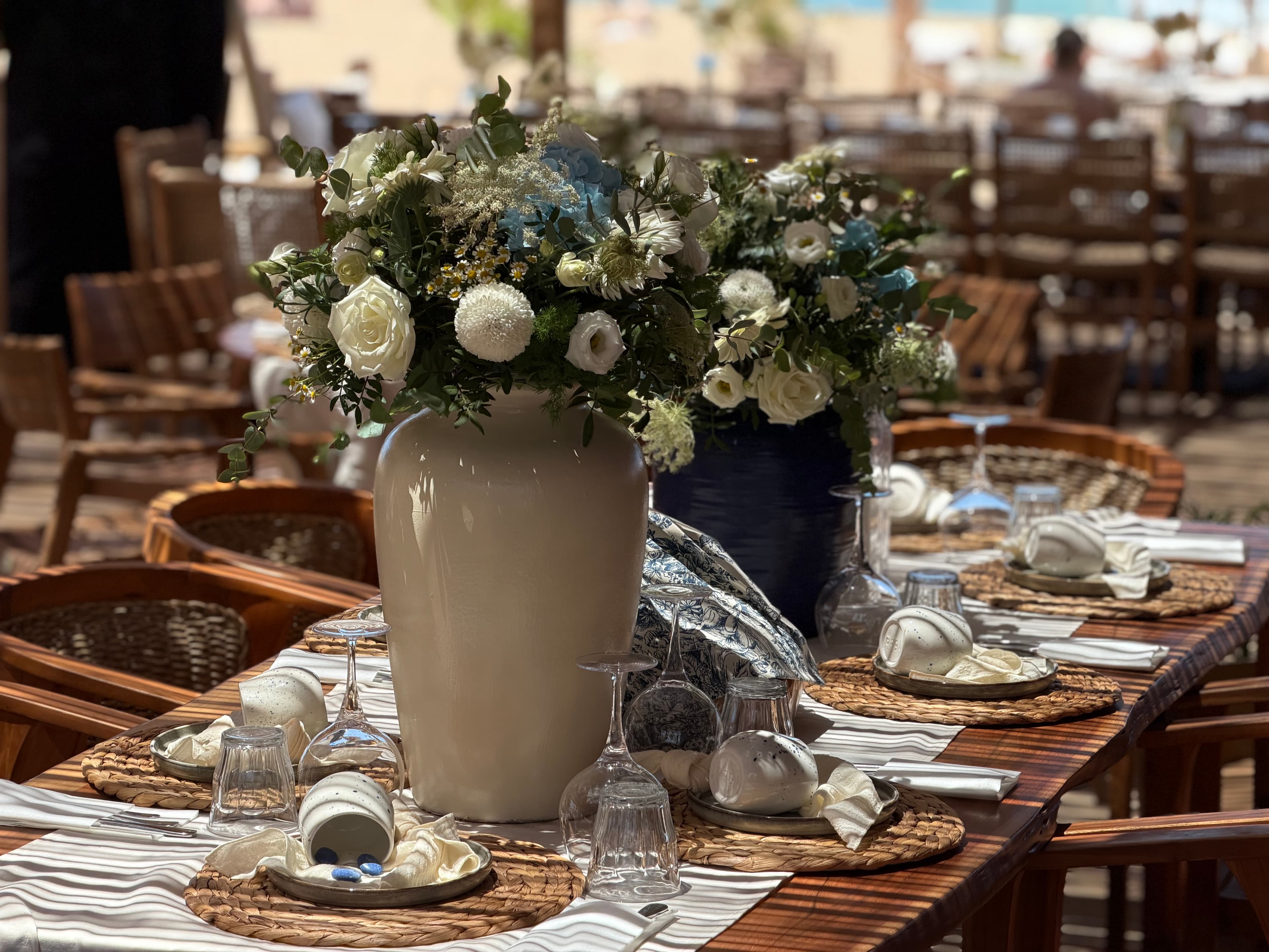 Elegant event table setup with flowers